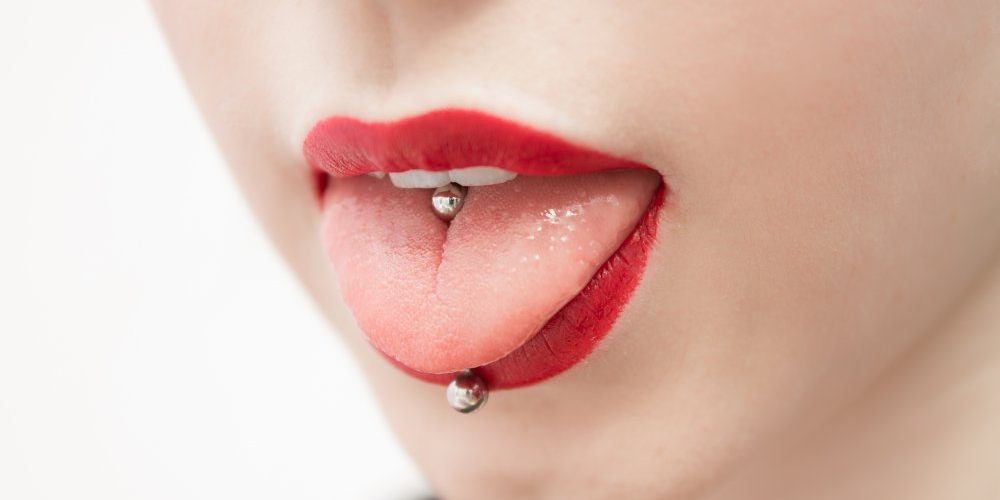 O Que Você Precisa Saber Antes de Colocar Um Piercing na Boca